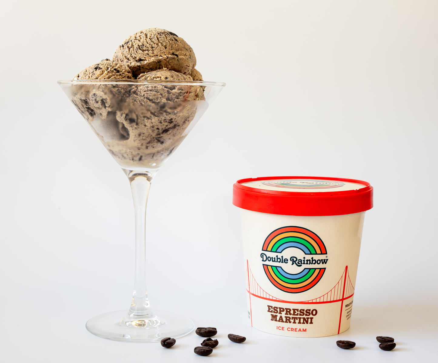 Espresso Martini scoops in a martini glass next to a pint of Espresso Martini by Double Rainbow